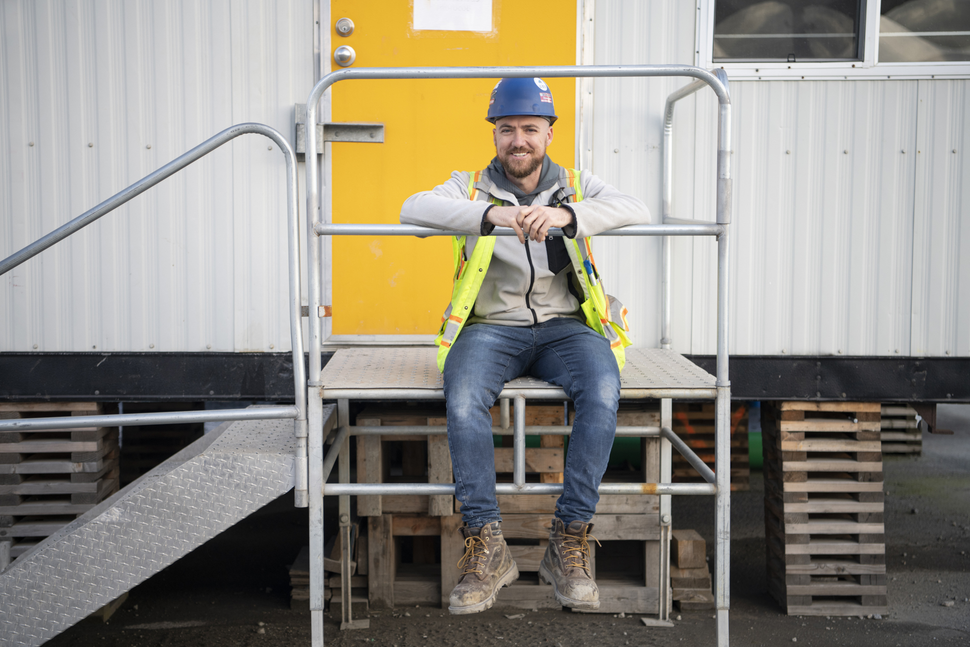 An image of a smiling male worker