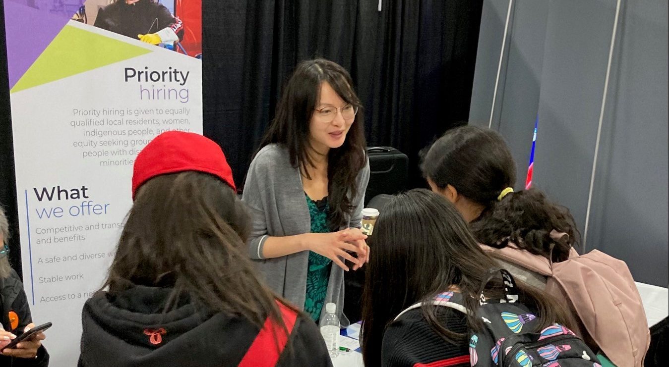 An image of a woman doing recruitment and onboarding