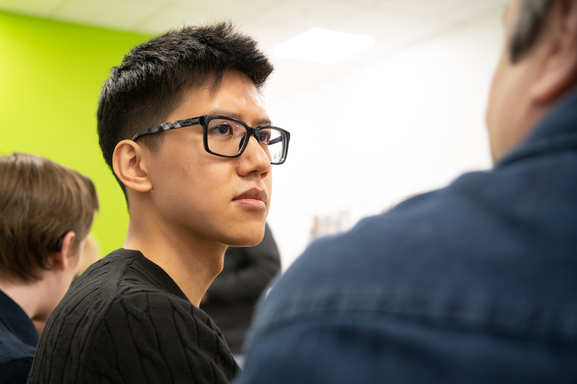 An image of a man with glasses